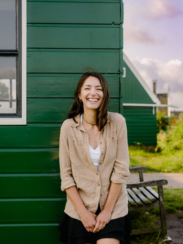 Olga from Mini Jetsetter smiling in Amsterdam